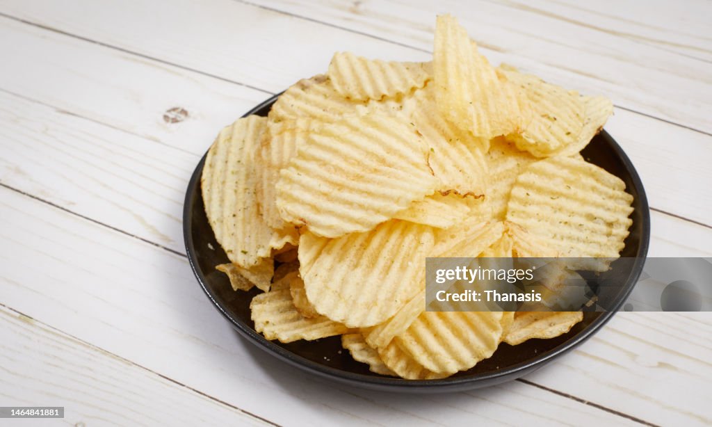 Close-up of crispy fried waffle potato chips