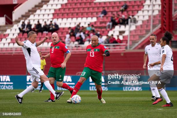 Council Member and Royal Moroccan Football Federation President Fouzi Lekjaa in action against FIFA Legend Houssine Kharja during a Legends match...