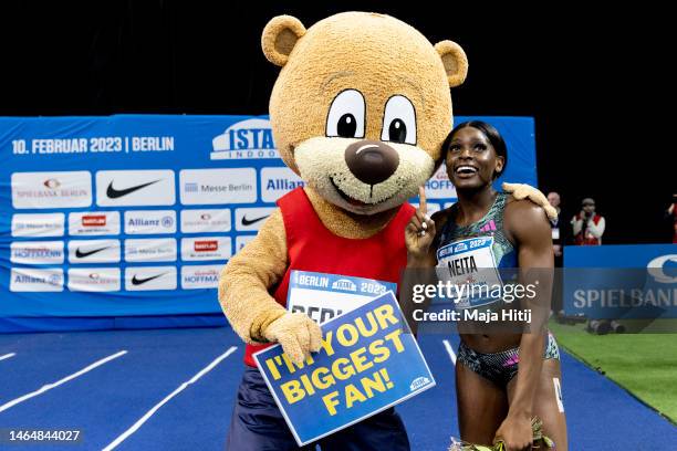 Daryll Neita of Great Britain celebrates with mascot Berlino after winning the Women's 60 Metres during the ISTAF Indoor Berlin at Mercedes-Benz...