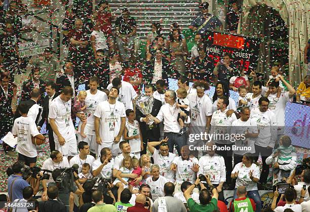 The Montepaschi Siena team celebrate after victory in the Lega Basket Serie A Championship after game five of the Lega Basket Serie A Finals between...