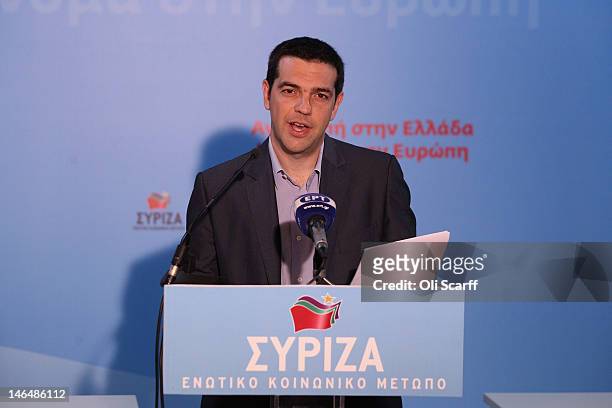 Alexis Tsipras, the leader of the Syriza party, speaks during a press conference in his party's offices following an expected second place in the...