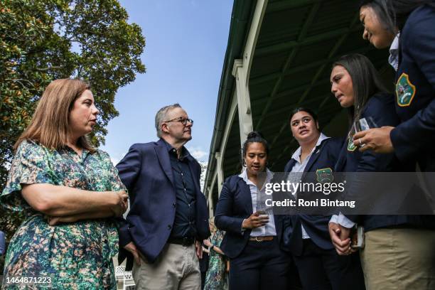 Australian Prime Minister Anthony Albanese and Minister for Sport Anika Wells speak with members of the Australian Wallaroos women's rugby union team...