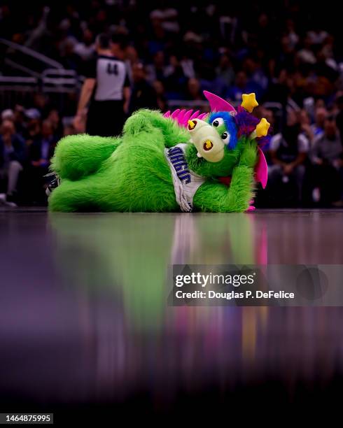 Stuff the Magic Dragon of the Orlando Magic performs for the fans during the fourth quarter of the game against the Denver Nuggets at Amway Center on...