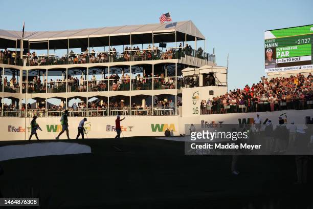 General view is seen as James Hahn of the United States waves to fans on the 16th green during the second round of the WM Phoenix Open at TPC...