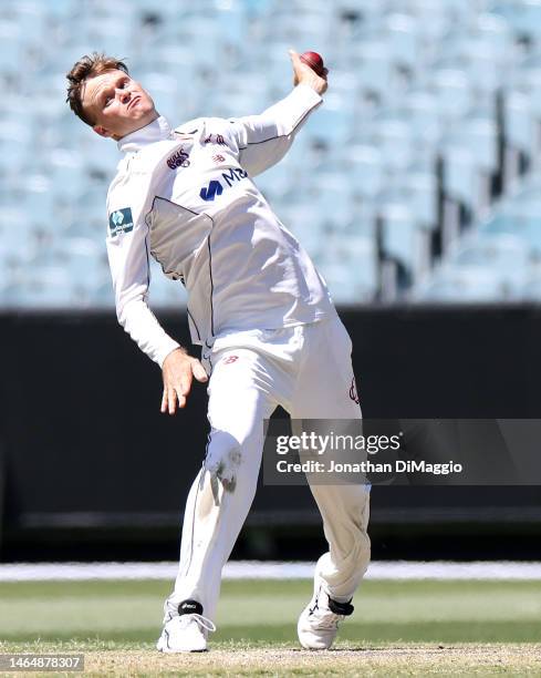 Matthew Kuhnemann of Queensland bowls during the Sheffield Shield match between Victoria and Queensland at Melbourne Cricket Ground, on February 11...