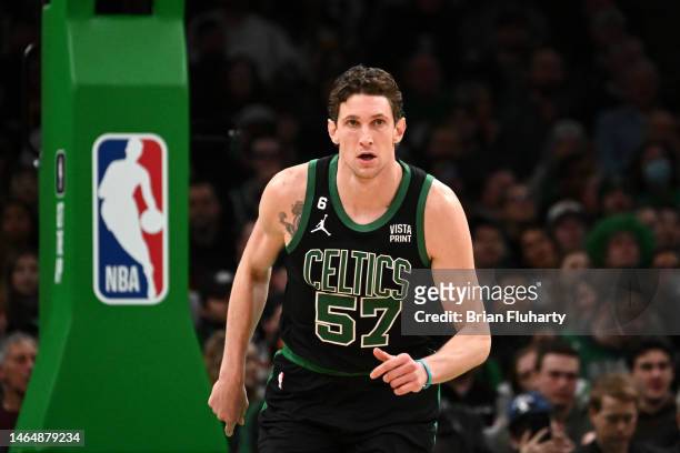 Mike Muscala of the Boston Celtics runs up the court during the first quarter of a game against the Charlotte Hornets at the TD Garden on February...