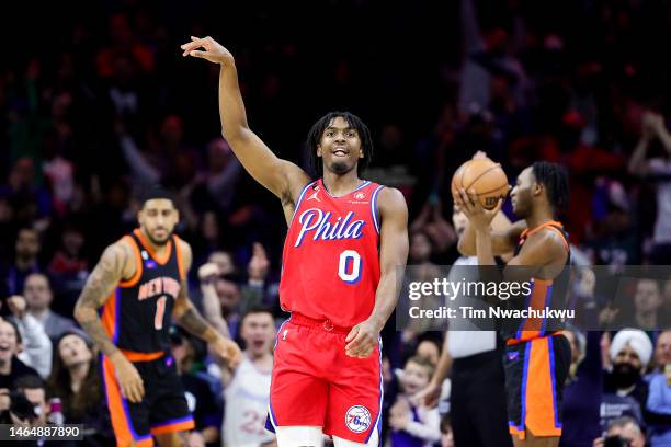 Tyrese Maxey of the Philadelphia 76ers reacts after scoring during the fourth quarter against the New York Knicks at Wells Fargo Center on February...