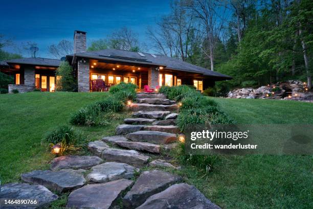 prairie style house at night - garden lighting bildbanksfoton och bilder