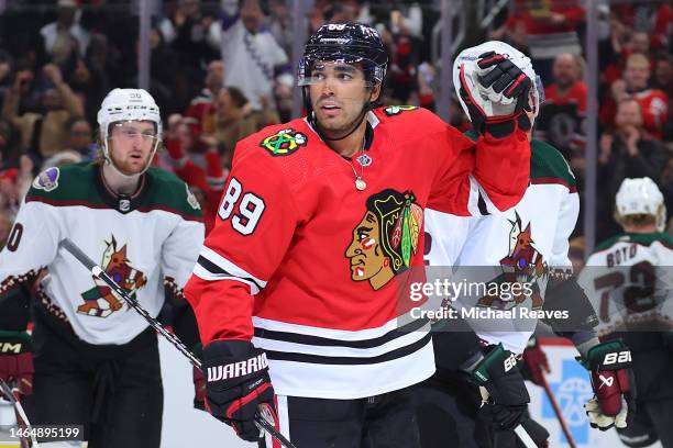 Andreas Athanasiou of the Chicago Blackhawks celebrates after scoring a goal against the Arizona Coyotes during the second period at United Center on...