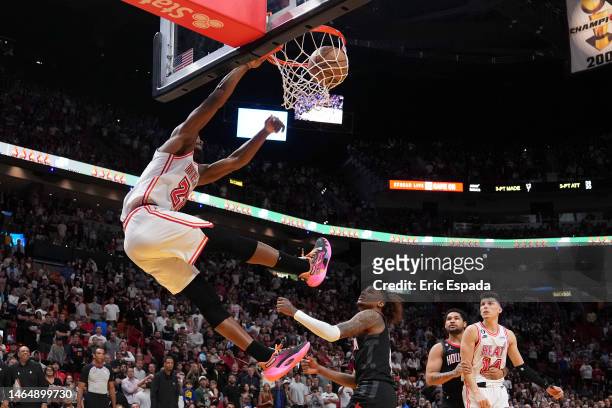 Jimmy Butler of the Miami Heat slams the basketball with .3 seconds left on the clock in the fourth quarter against the Houston Rockets at Miami-Dade...