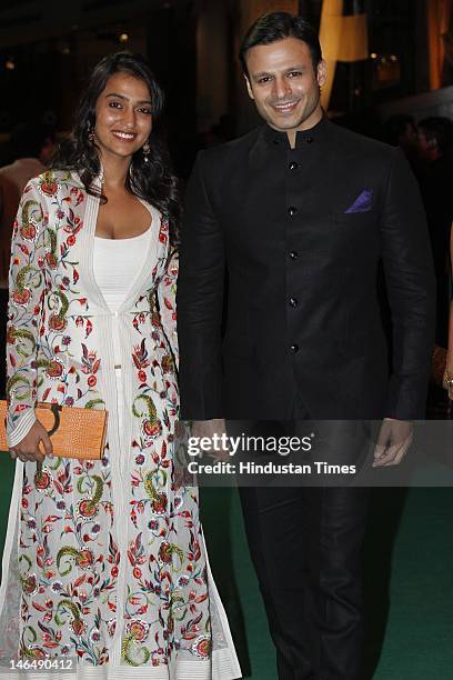 Bollywood actor Vivek Oberoi with his wife Priyanka Oberoi at IIFA Rocks green carpet on the 2nd day of 13th International Indian Film Academy Awards...
