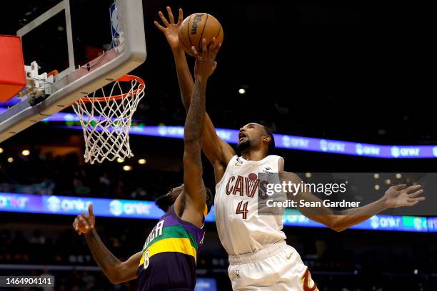 Evan Mobley of the Cleveland Cavaliers blocks the shoot of Naji Marshall of the New Orleans Pelicans during the second quarter of an NBA game at...