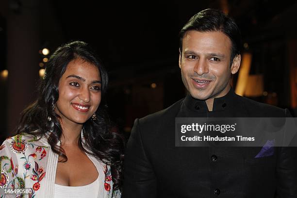 Bollywood actor Vivek Oberoi with his wife Priyanka Oberoi at IIFA Rocks green carpet on the 2nd day of 13th International Indian Film Academy Awards...