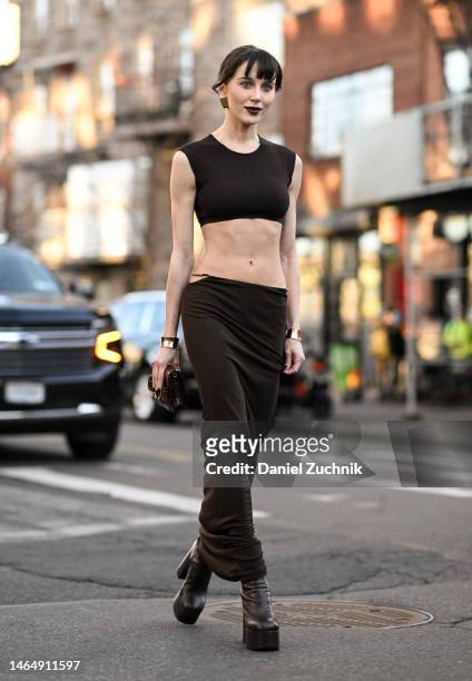Mary Leest is seen wearing a Zeynep Arcay brown outfit, brown boots and brown bag outside the Rodarte show during New York Fashion Week F/W 2023 on...