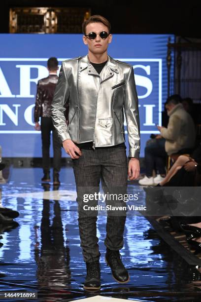 Model walks the runway wearing Carlos Benguigui during NYFW hiTechMODA Season 9 at Gotham Hall on February 10, 2023 in New York City.