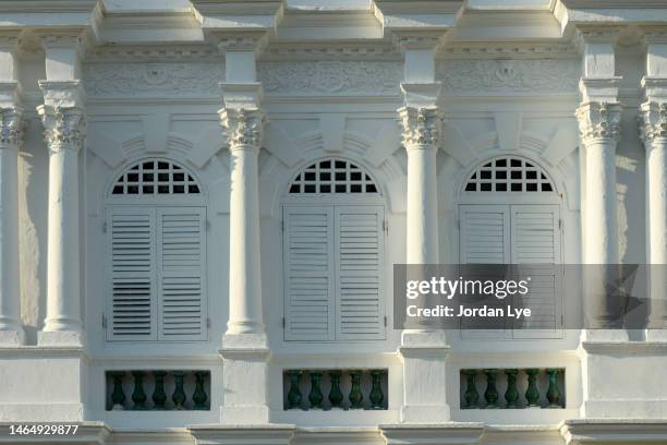 an old colonial buildings style window in penang - malaysia architecture stock-fotos und bilder