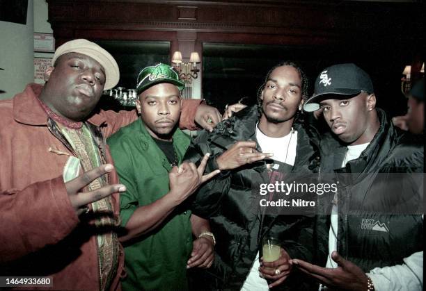 Portrait of, from left, American rappers Notorious BIG , Nate Dogg , Snoop Dogg , and Sean Combs attend the premiere party for 'Murder Was the Case'...