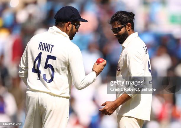 Rohit Sharma speaks with Ravindra Jadeja during day three of the First Test match in the series between India and Australia at Vidarbha Cricket...