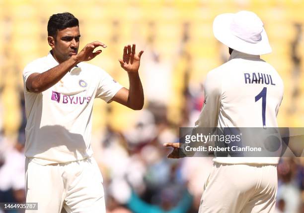 Ravichandran Ashwin of India celebrates taking the wicket of Alex Carey of Australia during day three of the First Test match in the series between...