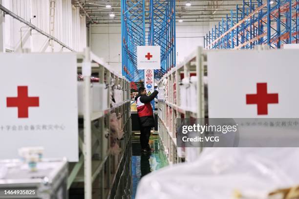 Member of the Red Cross Society of China prepares relief supplies at a warehouse on February 8, 2023 in Beijing, China. The Red Cross Society of...