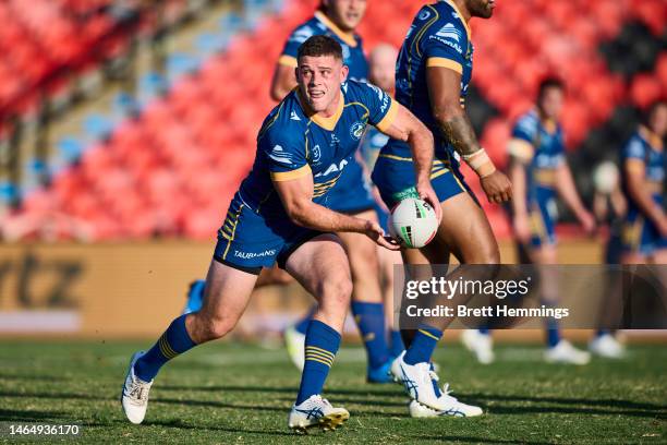 Jayden Yates of the Eels passes the ball during the NRL Trial Match between the Penrith Panthers and the Parramatta Eels at BlueBet Stadium on...