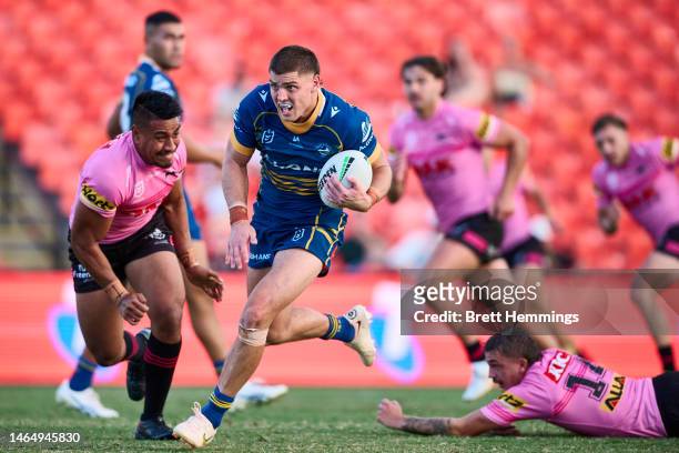 Sean Russell of the Eels makes a break during the NRL Trial Match between the Penrith Panthers and the Parramatta Eels at BlueBet Stadium on February...