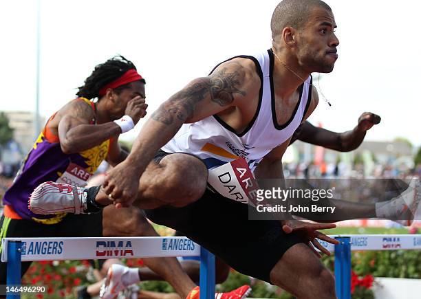 Garfield Darien of France wins the 110m hurdles final during the 2012 French Elite Athletics Championships at the Stade du Lac de Maine on June 17,...