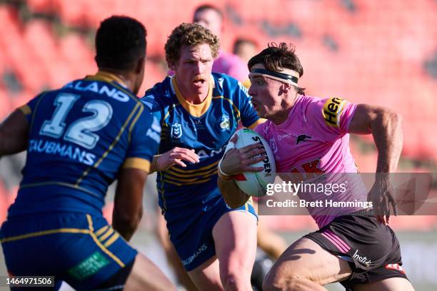 Luke Sommerton of the Panthers makes a break during the NRL Trial Match between the Penrith Panthers and the Parramatta Eels at BlueBet Stadium on...