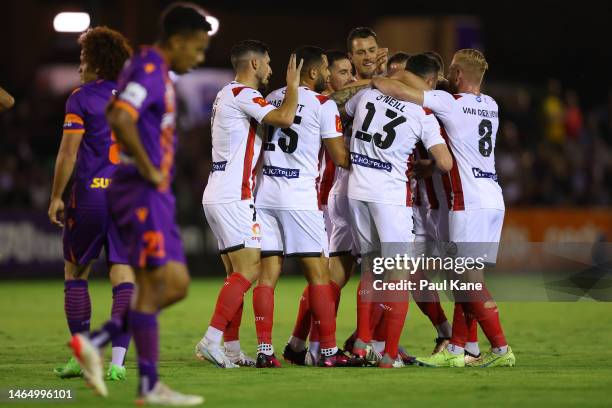 Jordan Bos of Melbourne City is congratulated by team mates after scoring during the round 16 A-League Men's match between Perth Glory and Melbourne...