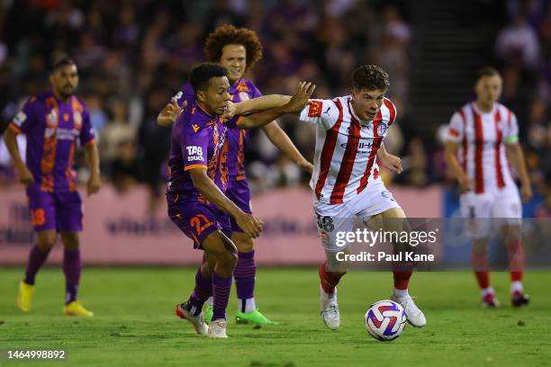 Jordan Bos of Melbourne City controls the ball against Antonee Burke-Gilroy of the Glory during the round 16 A-League Men's match between Perth Glory...