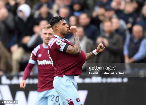 Emerson Palmieri of West Ham United celebrates after scoring the team's first goal during the Premier League match between West Ham United and...