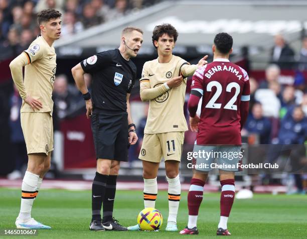 Joao Felix of Chelsea interacts with Referee Craig Pawson during the Premier League match between West Ham United and Chelsea FC at London Stadium on...