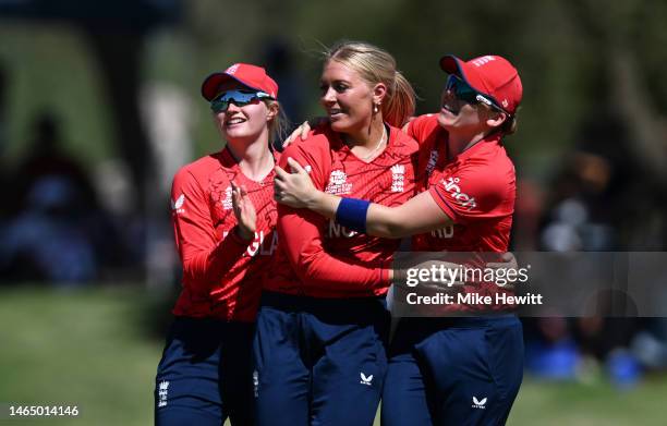 Sarah Glenn of England celebrates the wicket of Stafanie Taylor of West Indies with team mates Charlie Dean and Heather Knight during the ICC Women's...