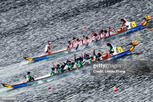 China and Macao teams complete in Dragon Boat the Women's 200m straight Repechage 1 on Day 2 of the 3rd Asian Beach Games Haiyang 2012 at Jiulong...