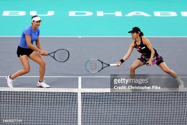 Miyu Kato of Japan and Monica Niculescu of Romania in action against Luisa Stefani of Brazil and Shuai Zhang of China during their Women's Doubles...