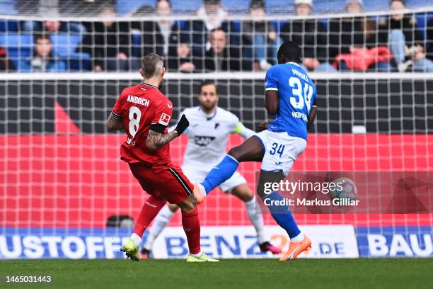 Robert Andrich of Bayer 04 Leverkusen scores the team's first goal during the Bundesliga match between TSG Hoffenheim and Bayer 04 Leverkusen at...