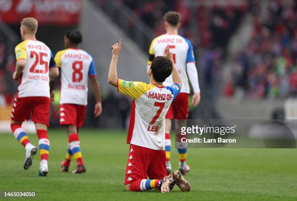 Lee Jae-Song of 1.FSV Mainz 05 celebrates after scoring the team's first goal during the Bundesliga match between 1. FSV Mainz 05 and FC Augsburg at...