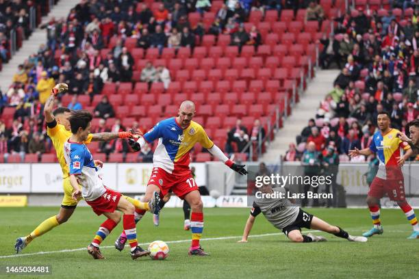 Lee Jae-Song of 1.FSV Mainz 05 scores the team's first goal during the Bundesliga match between 1. FSV Mainz 05 and FC Augsburg at MEWA Arena on...