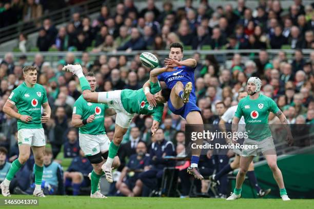Conor Murray of Ireland is tackled by Ethan Dumortier of France during the Six Nations Rugby match between Ireland and France at Aviva Stadium on...
