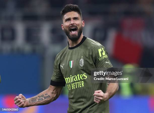 Olivier Giroud of AC Milan celebrates scoring his goal during the Serie A match between AC MIlan and Torino FC at Stadio Giuseppe Meazza on February...