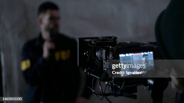 movie a scene with an fbi agent - action movie chase stock pictures, royalty-free photos & images