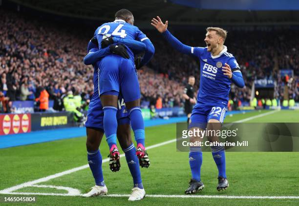 Nampalys Mendy of Leicester City celebrates with teammate Kelechi Iheanacho and Kiernan Dewsbury-Hall after scoring the team's first goal during the...