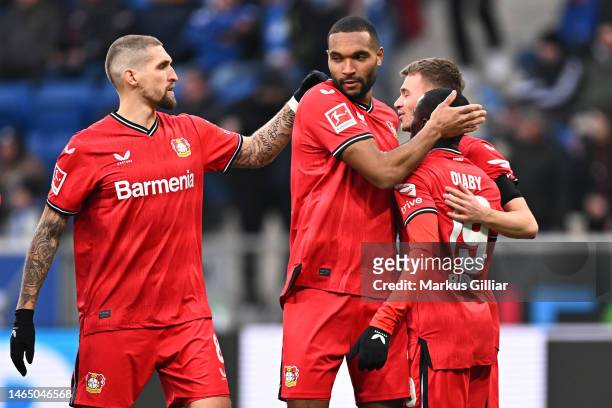 Moussa Diaby of Bayer 04 Leverkusen celebrates with teammates after scoring the team's second goal during the Bundesliga match between TSG Hoffenheim...