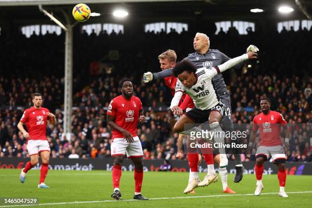 Keylor Navas of Nottingham Forest clears the ball from Willian of Fulham during the Premier League match between Fulham FC and Nottingham Forest at...