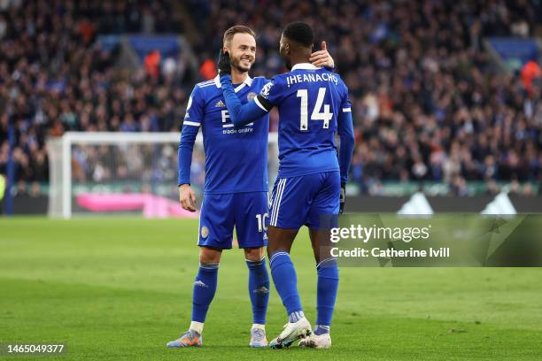 Kelechi Iheanacho of Leicester City celebrates with teammate James Maddison after scoring the team's third goal during the Premier League match...