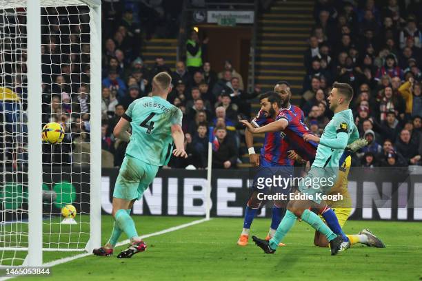 James Tomkins of Crystal Palace scores their sides first goal during the Premier League match between Crystal Palace and Brighton & Hove Albion at...