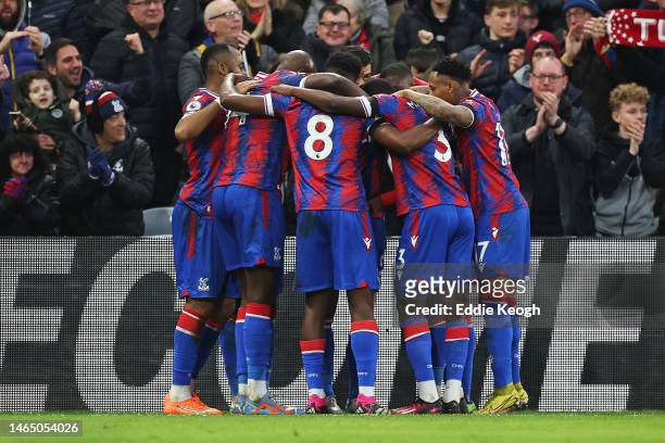 James Tomkins of Crystal Palace celebrates with team mates after scoring their sides first goal during the Premier League match between Crystal...