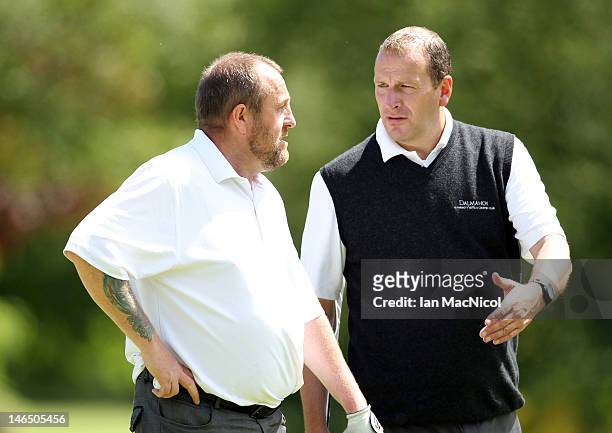 John McHardy and Alan Tait of Marriott Dalmahoy Golf and Country Club discuss a shot during the Virgin Atlantic PGA National Pro-Am Championship -...