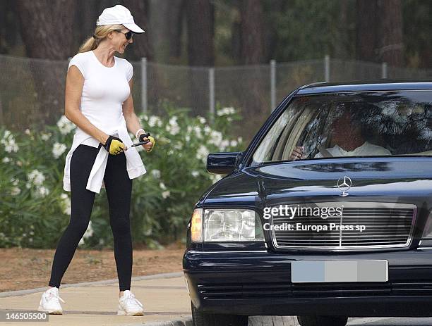 Julio Iglesias and his wife Miranda Rijnsburger are seen kissing each other while their children are playing on June 5, 2012 in Marbella, Spain.