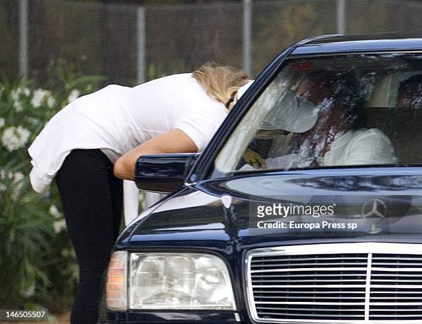 Julio Iglesias and his wife Miranda Rijnsburger are seen kissing each other while their children are playing on June 5, 2012 in Marbella, Spain.